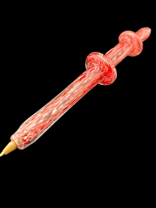 Red and white speckled Pen